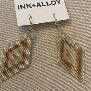 Ink & Alloy drop earring.  Metallic and so beautiful.  Never worn